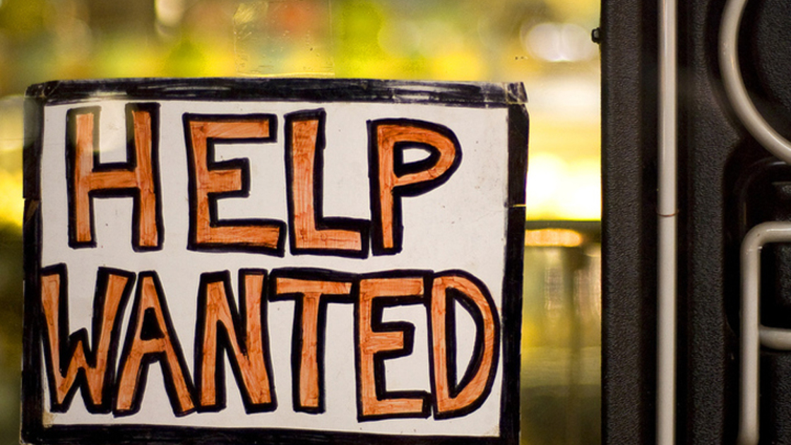 Photo of help wanted sign for job seekers