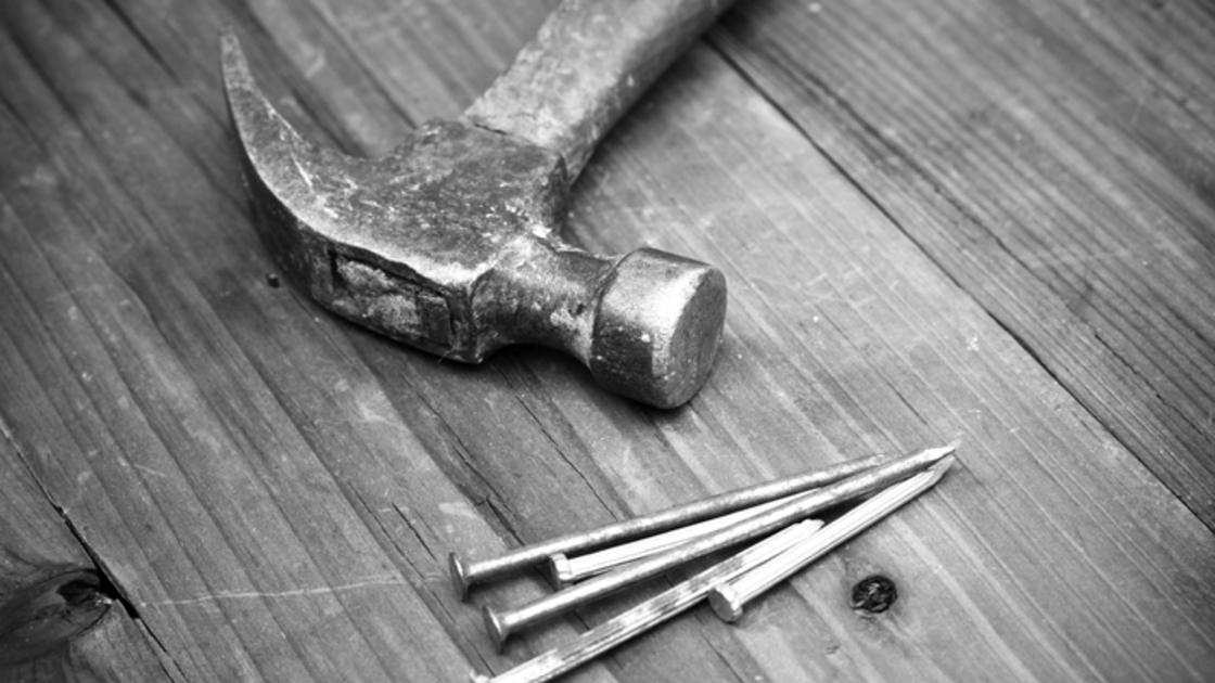 Hammer and nails black and white