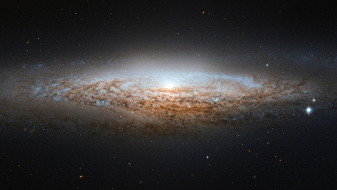 A photo of a galaxy. Who was Christ before His physical birth?