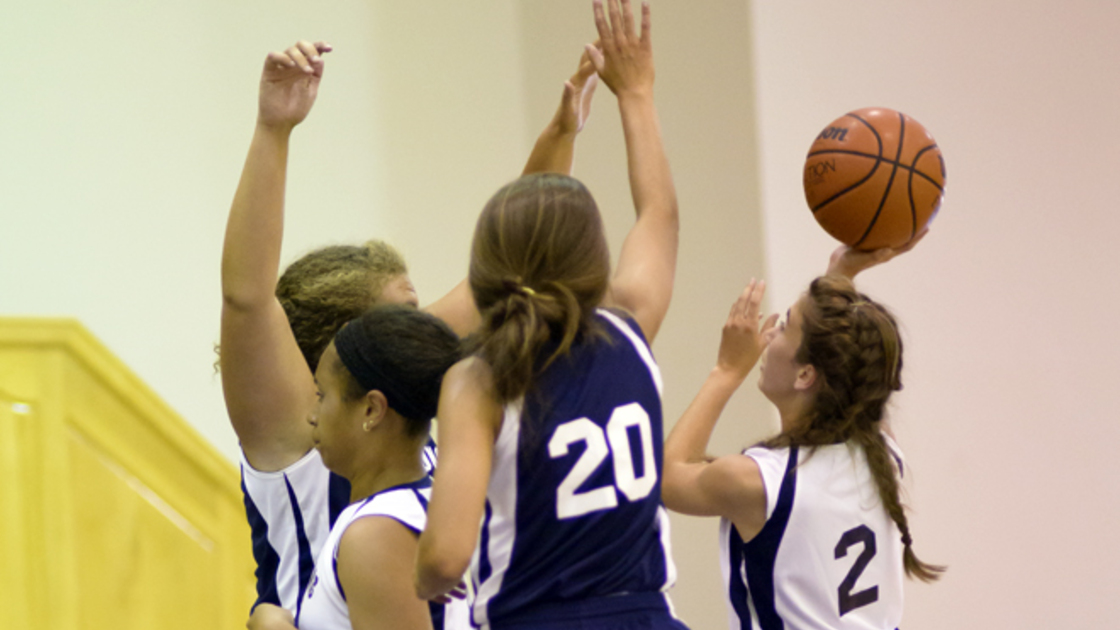 Girls playing basketball at Philadelphia Youth Camp