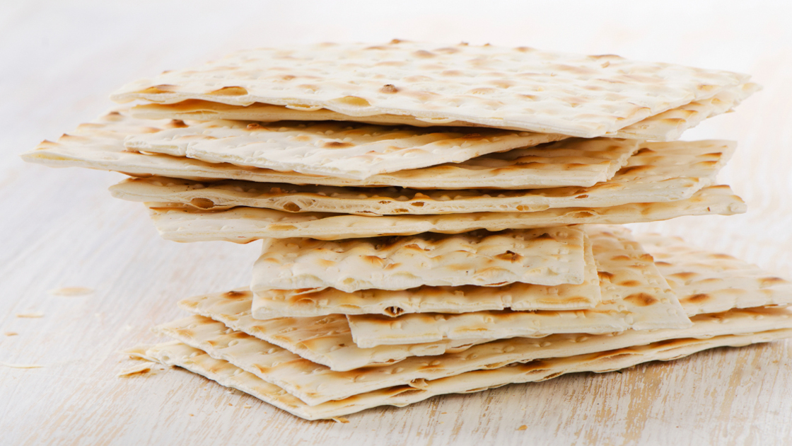 16x9(How to keep Unleavened Bread)
matzoh - jewish passover bread on a wooden table. Selective focus