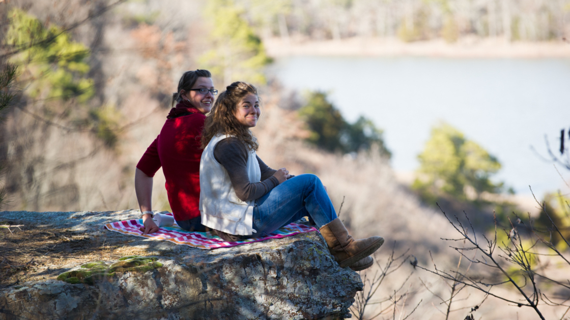 Students of Herbert W. Armstrong College enjoy their view of a lake at Robber's Cave.