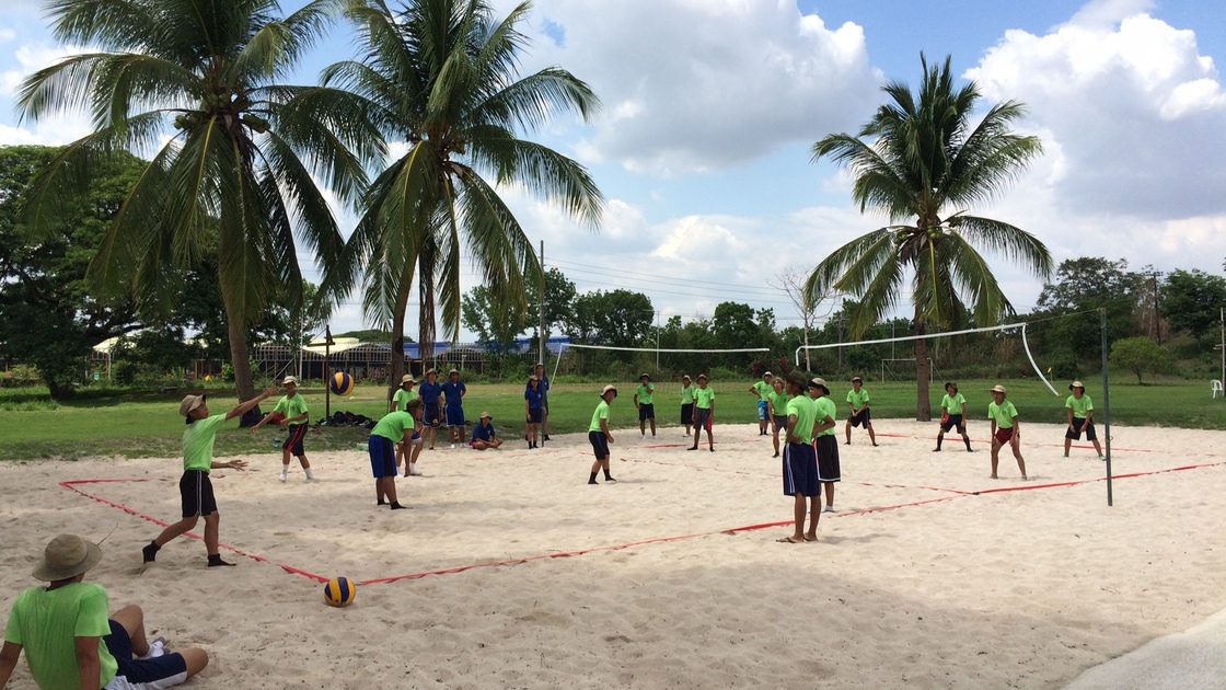 1B and 2B serve it up during volleyball at PYC Philippines. 