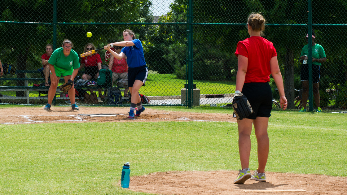 A member of 6G swings for the ball during a game of softball at PYC 2015.