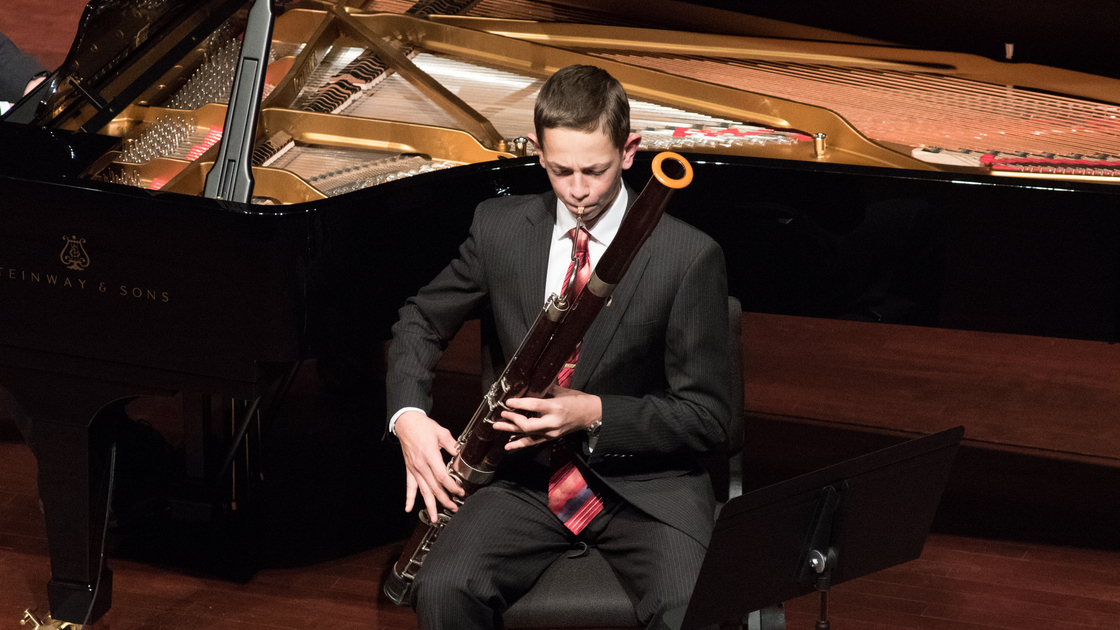 Imperial Academy student plays the bassoon at the Imperial Academy Fall recital (2015). 