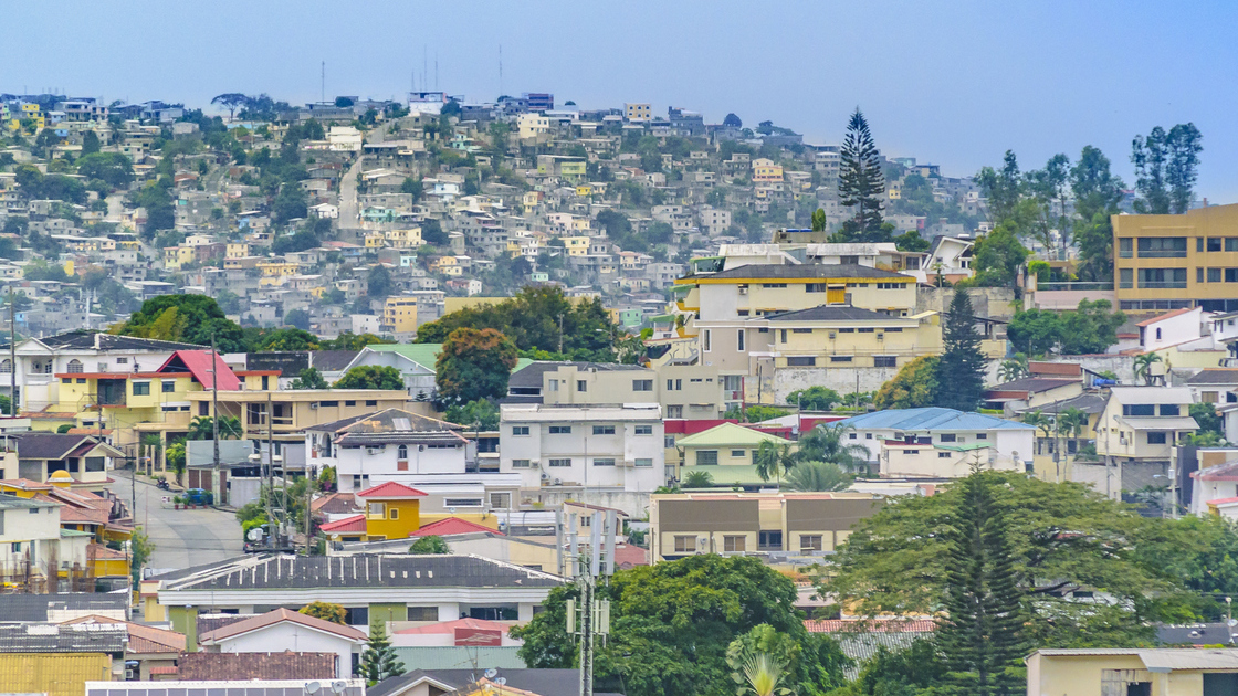 Elegant neighborhood and favela hill view of Guayaquil city, Ecuador