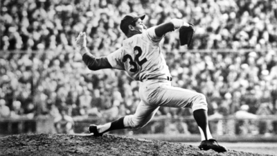 4/24/1962-Chicago, IL: Los Angeles Dodger Sandy Koufax shows winning form as he throws during a game with the Chicago Cubs.  Koufax struck out 18 Chicago Cubs setting a National League daytime strikeout record and tying his own overall National League strikeout mark.  The Dodgers won, 10-2.