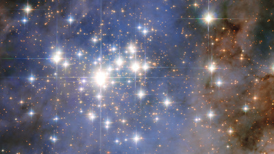 This NASA/ESA Hubble Space Telescope image features the star cluster Trumpler 14. One of the largest gatherings of hot, massive and bright stars in the Milky Way, this cluster houses some of the most luminous stars in our entire galaxy.