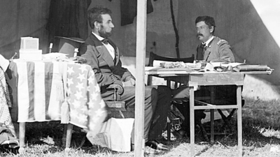Abraham Lincoln and George B. McClellan in the general's tent at Antietam, Maryland, October 3, 1862.